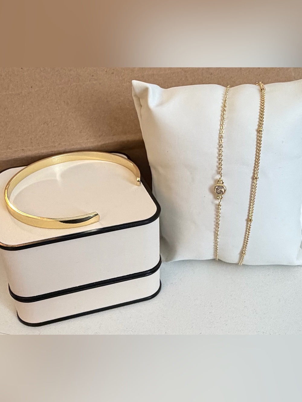 3 gold-toned bracelet set